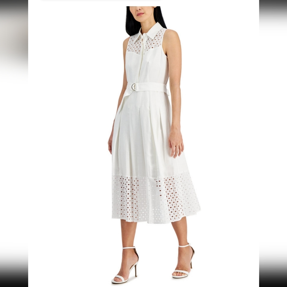White shirt waist, linen blend,pleated, self belt. Worn twice. Dry cleaned